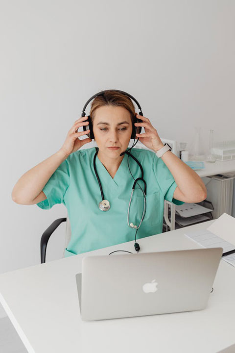 a-female-doctor-using-a-laptop