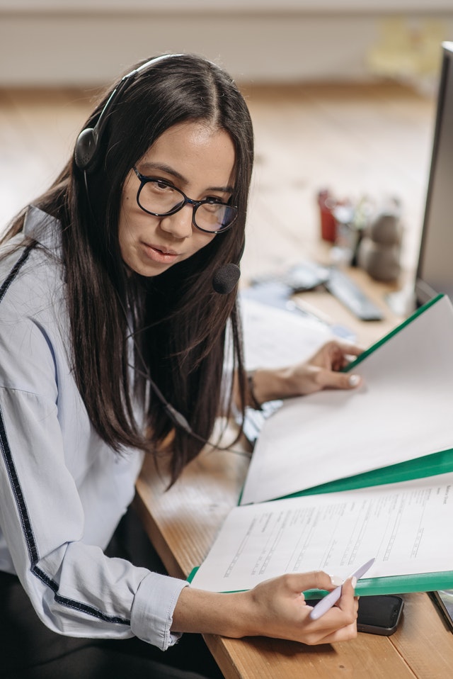 woman-in-white-long-sleeve-shirt-wearing-black-framed-eyeglasses